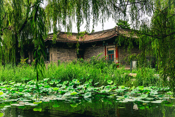 One of the classical buildings with architectural style of spacious garden surrounded in the old summer palace of Yuanmingyuan in Beijing, China.