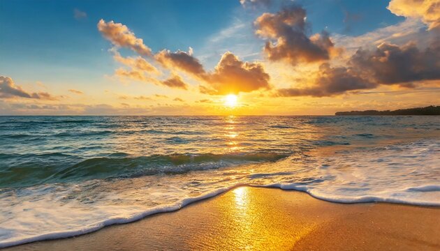 beach sunset beautiful panoramic landscape colorful golden sunset sky clouds closeup calm sea with waves splashing softly on sandy beach amazing sunrise landscape summer nature peaceful coast