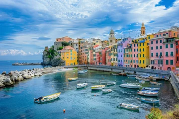 Foto op Canvas A charming seaside town with pastel-colored buildings © Daniel