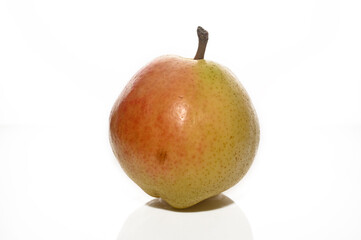 One red yellow pear fruits with green leaf isolated on white with clipping path. Full depth of field.