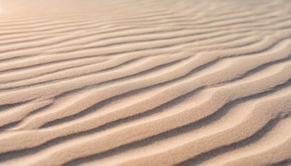 beige pink sand texture natural background close up waves pattern on sand dunes light pastel color...
