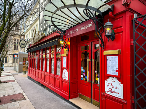 Rouen, France - 19.02.2024. Entrance to Pascaline Restaurant at Rue de la Poterne view in Rouen, Normandy, France. Medieval street view of historical center of Rouen with half-timbered houses 