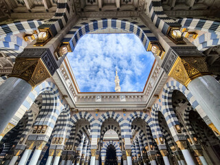 Courtyard of the Al Haram or Al-Masjid an-Nabawi mosque in Medina Saudi Arabia on a sunny day. It...