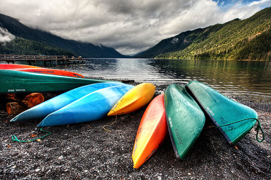 Kayaks on the shore at Lake Crescent in Washington.