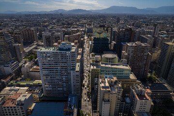 Beautiful aerial footage of the Plaza de Armas, Metropolitan Cathedral of Santiago de Chile, National History Museum of Chile, Central Market and the city of Santiago de  Chile