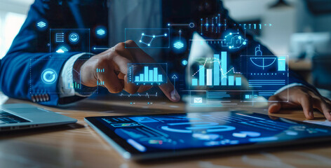 
Businessman manages marketing plan on digital tablet, collaborates on business development in office with virtual background.