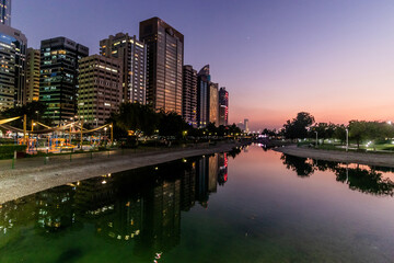 Abu Dhabi skyline from The Lake Park, United Arab Emirates.