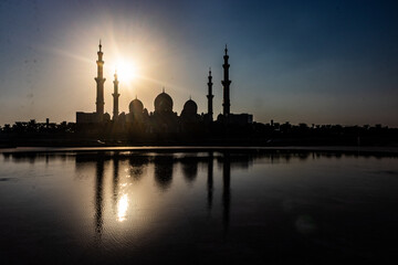 Silhouette of Sheikh Zayed Grand Mosque in Abu Dhabi, United Arab Emirates.