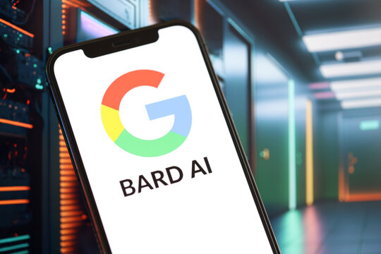 KYIV, UKRAINE - MARCH 17, 2024 Google Bard logo on iPhone display screen with background of artificial intelligence futuristic ai generated image close up