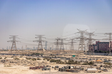 Pylons of high voltage electric transmission lines in Dubai, United Arab Emirates.