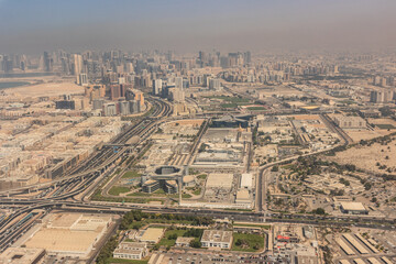 Aerial view of Dubai and Sharjah, United Arab Emirates.