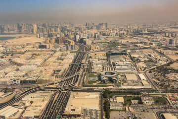 Aerial view of Dubai and Sharjah, United Arab Emirates.