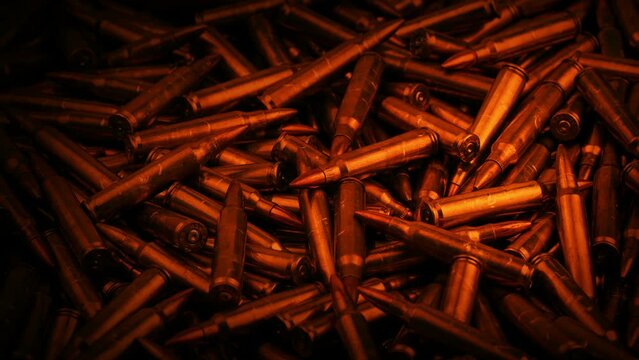 Pile Of Bullets In Firelight Closeup