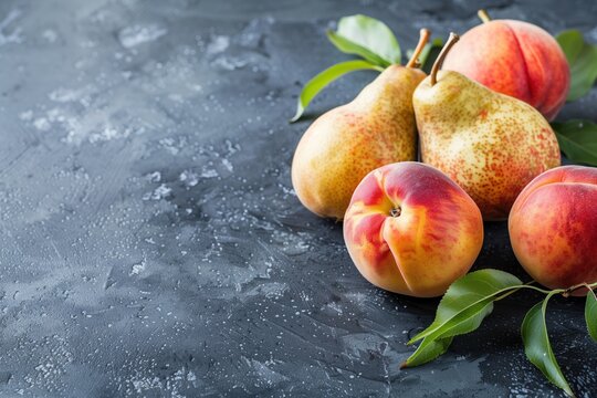 Ripe Pears and Peaches on Dark Surface