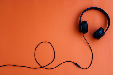 headphones on a orange background