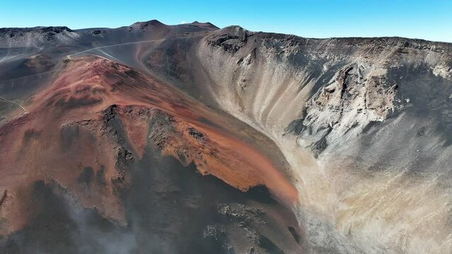 Haleakala Crater looms 10,023 feet above the Pacific Ocean, taking up three-quarters of Maui’s 727 square miles. Haleakala sunrise inspire 1.5 million visitors annually.