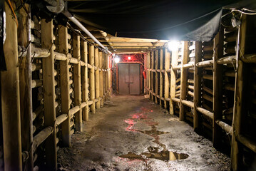 Underground tunnel in coal mine with airlock doors