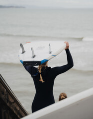 Woman with a Surfboard