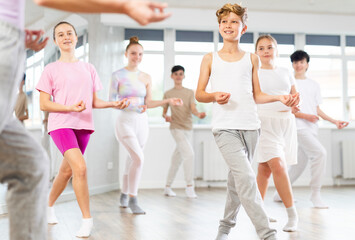 Group of children boys and girls dance jazz funk in studio