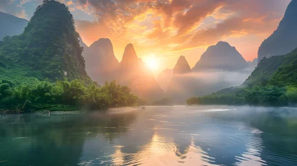 Foto op Canvas Spectacular Sunrise over Tranquil River and Verdant Mountains - An Ethereal Landscape Photography © Addie