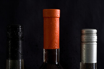 Macro Image of Wine Bottle Tops with Black Background