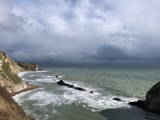 Rocks off the Dorset coast at Man O'War Cove, Dorset, England, United Kingdom