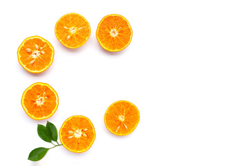 Vitamin C pills with  fresh orange citrus fruit isolated on white background.