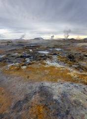 Hverir,  geothermal spot noted for its bubbling pools of mud and steaming fumaroles emitting sulfuric gas.