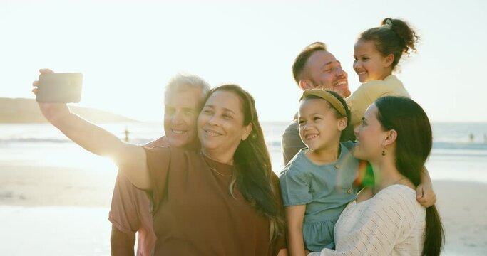 Family, diverse and selfie with smile, beach and adventure for cape town holiday. Parents, children and smartphone with photo, memories and love for bonding together on vacation at ocean to relax