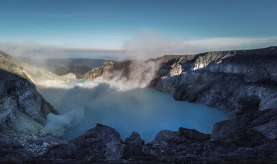 Sunrise at famous Ijen volcano crater and in east Java, Indonesia