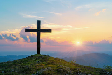 Religious background with cross and sunset sky on mountain hill