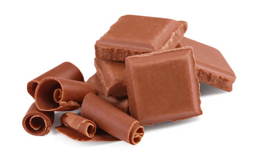 Delicious chocolate shavings and pieces isolated on white