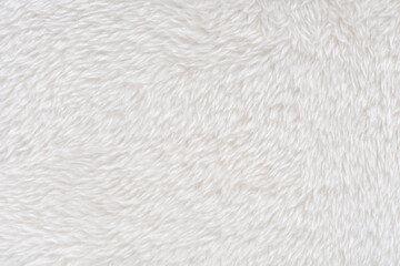 white plush fabric texture background, background pattern of soft warm material