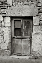 Gray Wooden Door with Missing Window