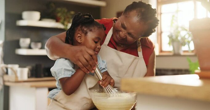 Grandmother, kid and mixing for baking in kitchen, education and learning for child development. Black family, home and love for pastry or cake and dessert, whisk and happy while bonding on weekend