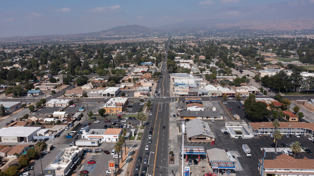 Beaumont, California, USA - October 09, 2021: Afternoon traffic passes through the downtown area on Beaumont Avenue.