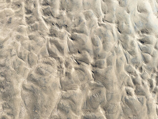 Coast wet sand pattern background