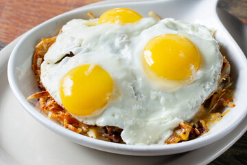 A closeup view of a breakfast skillet entree.