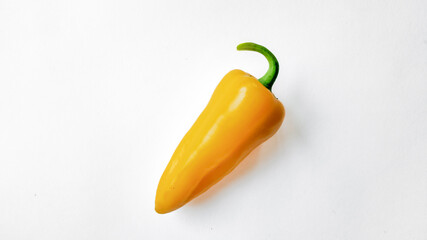 Bright yellow bell pepper isolated on a white background with ample space for text, perfect for...