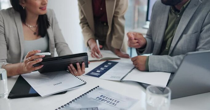 Closeup, business people and meeting with tablet, documents and proposal for funding. Startup, group and PR agency with tech and internet with paperwork and digital app with brainstorming or planning