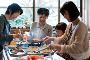 A Japanese family preparing and enjoying a traditional Japanese breakfast