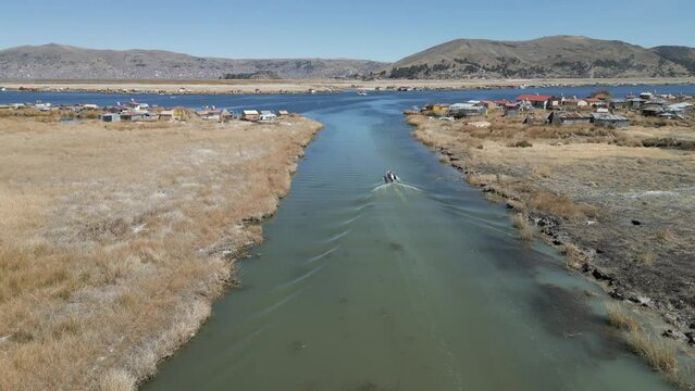 Aerial view of Uros Floating Islands on Lake Titicaca, the highest navigable lake in the world, on the border of Peru, South America.