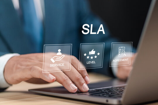 SLA, Service Level Agreement concept. Service performance tracking to reduce the uncertainty the customer in process. Businessman use laptop with SLA icon on virtual screen.