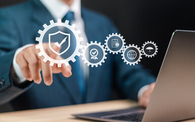 Safety quality management concept. Certified guarantee approval or Secure access system. Businessman touching shield with check mark on virtual screen. identity proofing for security protection system