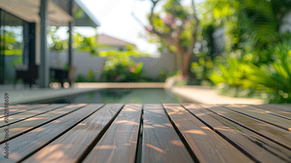 Poster empty wooden table space with green home backyard view blur background for advertising template : ge