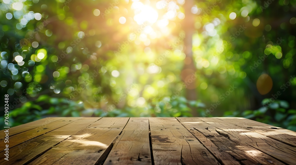 Poster empty wood table and defocused bokeh and blur background of garden trees with sunlight product displ