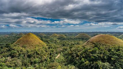 Amazing landscape of Bohol Island. Many unique karst mountains, covered with brownish vegetation,...