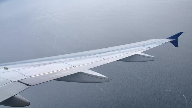 Airbus A320 Airplane Wing in Flight, Passenger Window View
