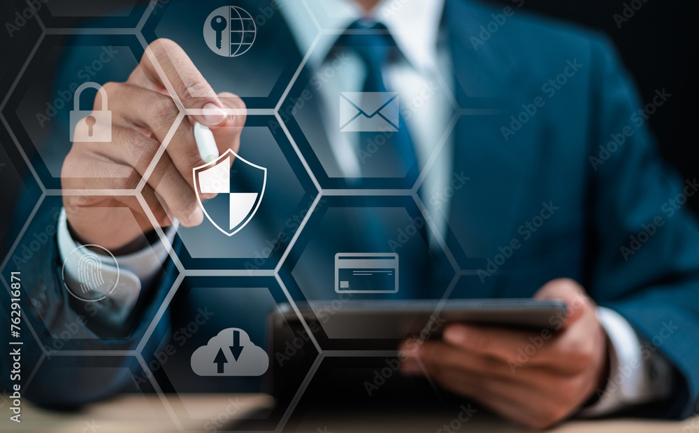 Poster cybersecurity and privacy access concept. businessman touching shield protection icon on virtual scr