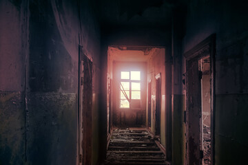 Fototapeta na wymiar The seaside house has long been abandoned. A long corridor overlooks to sea of Arctic Ocean